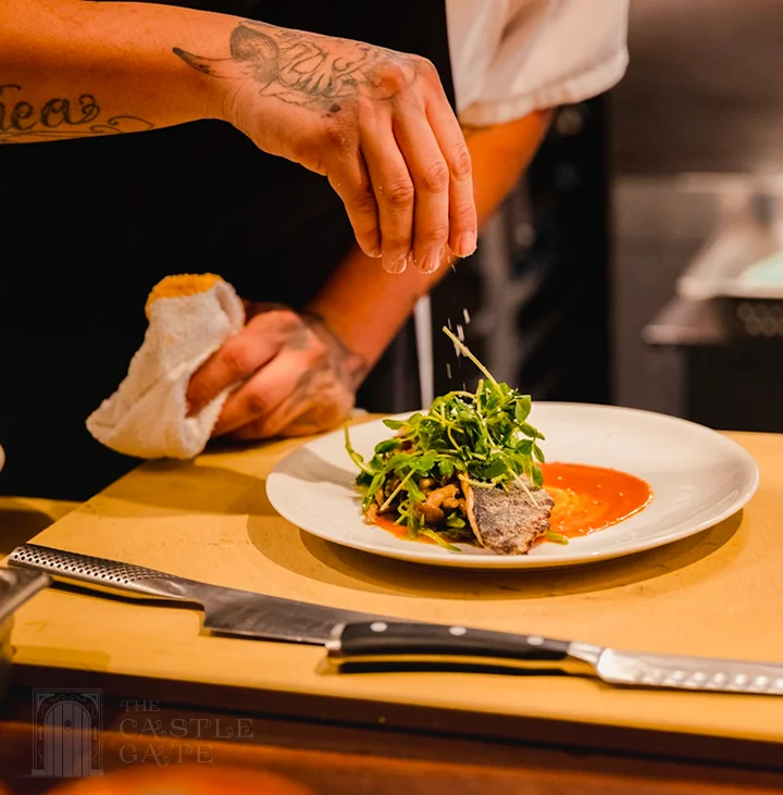 Chef preparing food at Restaurant in Graz
